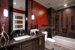 Photo of a bathroom with dark tiles