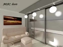 Wall-to-wall wardrobe in the living room design
