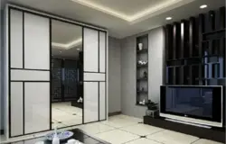 Wall-to-wall wardrobe in the living room design