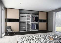 Wall-to-wall wardrobe in the living room design