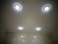 Light bulbs in the suspended ceiling in the bathroom photo