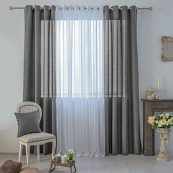 Curtains with eyelets in the bedroom interior