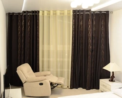 Curtains with eyelets in the bedroom interior