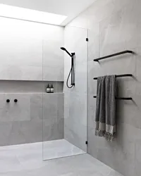 Gray bathroom design with shower