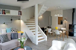 Kitchen living room with stairs to the 2nd floor photo