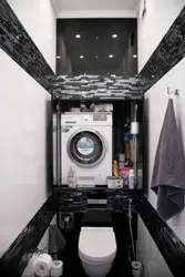 Bathroom design with black toilet and sink