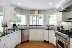 Kitchen with three windows design photo
