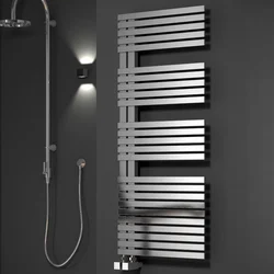 Electric Heated Towel Rail In The Bathroom Photo