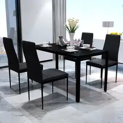 Black table and chairs in the kitchen photo