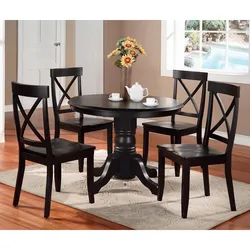 Black table and chairs in the kitchen photo