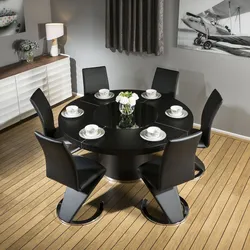 Black table and chairs in the kitchen photo