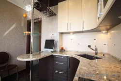 Kitchen in efficient apartments photo
