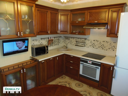 Kitchen in efficient apartments photo