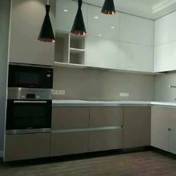 Kitchen in efficient apartments photo