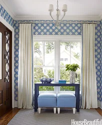 Blue curtains in the kitchen interior photo