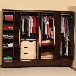 Wardrobe in the bedroom for clothes inside photo