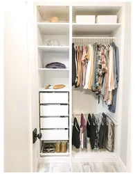 Wardrobe in the bedroom for clothes inside photo