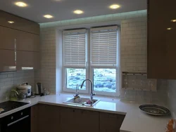 Curtains for plastic windows photo in the kitchen interior