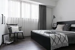 Gray curtains in the bedroom interior