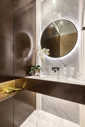 Bathroom with round mirror design