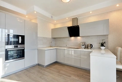 White plastic kitchen in the interior