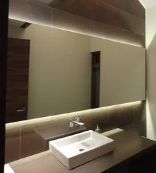 Bathroom With Wall-To-Wall Mirror Photo