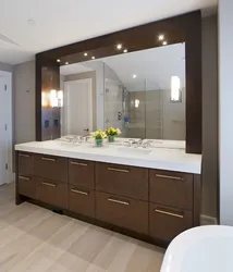 Bathroom with wall-to-wall mirror photo