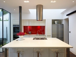 Kitchen with cylindrical hood design