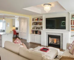 Photo kitchen living room with fireplace