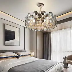 Chandeliers and lamps in the bedroom interior