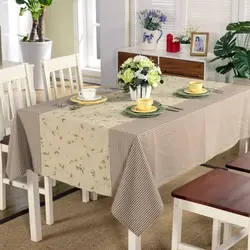Modern tablecloth on the kitchen table photo