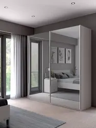 Modern bedroom wardrobe with mirror photo