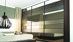 Modern bedroom wardrobe with mirror photo