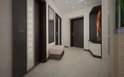 In the hallway there is a light floor in the interior photo