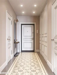 In the hallway there is a light floor in the interior photo