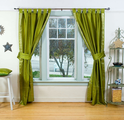 Olive curtains in the kitchen interior