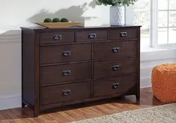 Chest of drawers in the bedroom made of wood photo