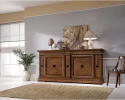 Chest of drawers in the bedroom made of wood photo
