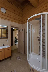 Bathtub In A Wooden House With Shower Design