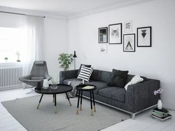 Living room design photo with black sofa
