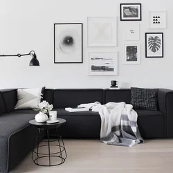 Living room design photo with black sofa