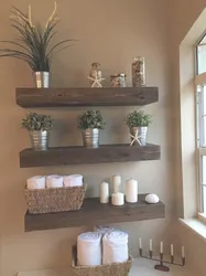 Photograph shelves in the bathroom