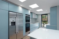 Silver Refrigerator In The Kitchen Interior