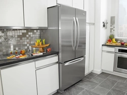 Silver Refrigerator In The Kitchen Interior