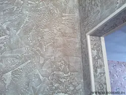 Decorative plaster world map in the hallway interior photo
