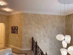 Decorative plaster world map in the hallway interior photo