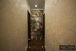 Decorative plaster world map in the hallway interior photo
