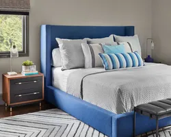 Blue bed in the bedroom photo