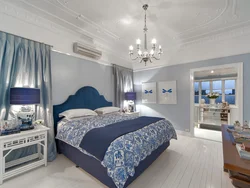Blue bed in the bedroom photo