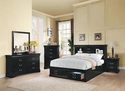 Dark Furniture In A Light Bedroom Interior